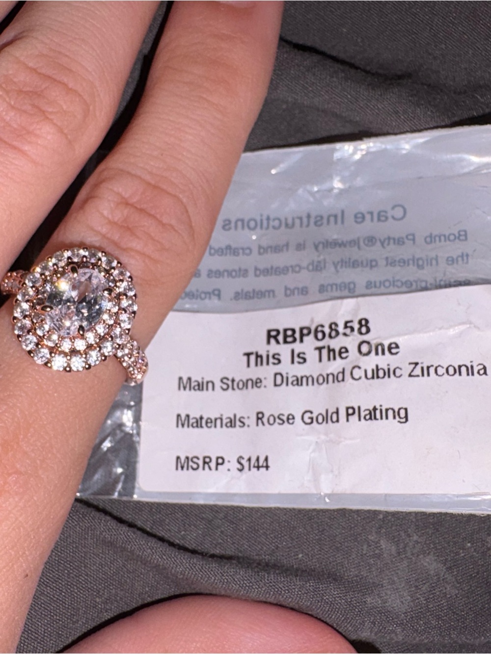 Rose Gold Halo Ring with Center Cubic Zirconia